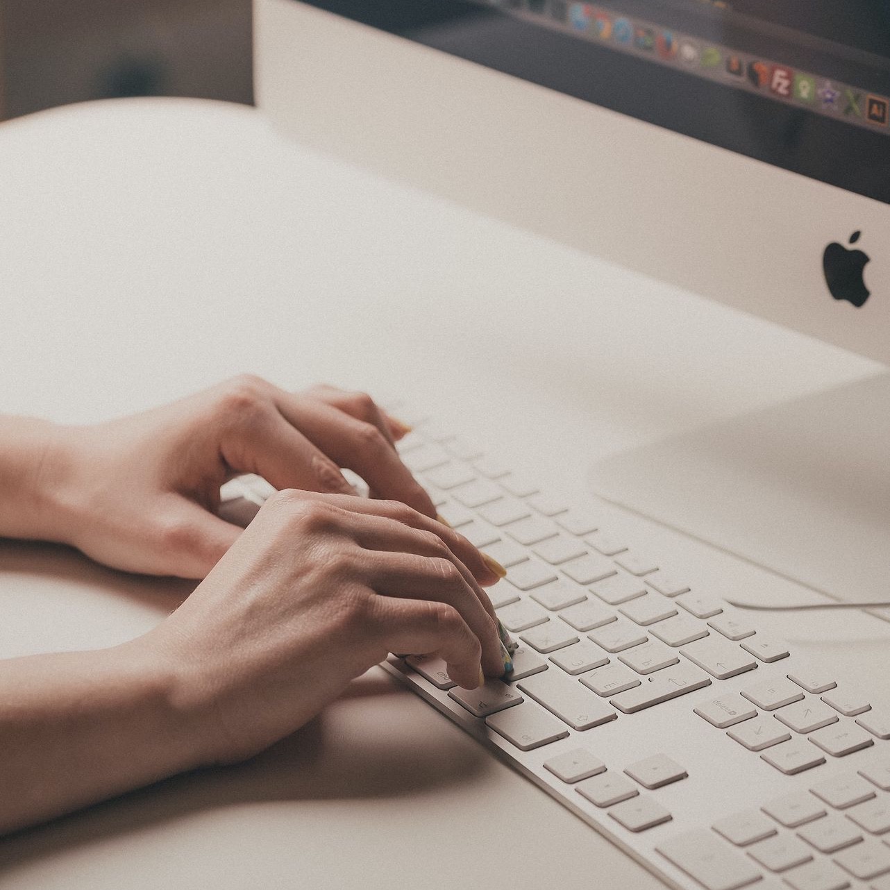 person using computer keyboard